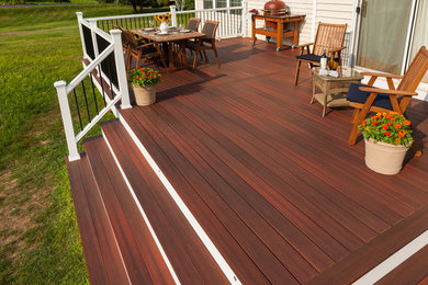 Deck - large traditional backyard deck idea in Boston with no cover