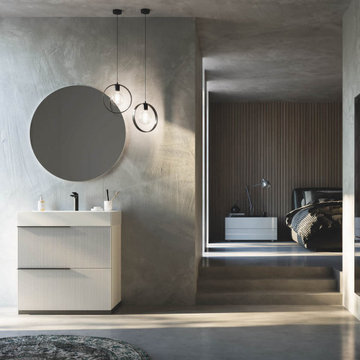 Modern bathroom with offwhite vanity with textured doors