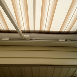 Striped Awning with a straight Valance. - Awnings