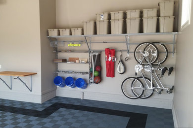 Inspiration for a mid-sized timeless garage remodel in Omaha