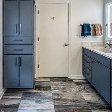 Primary Suite Remodel with Blue Cabinetry and Calacatta Miraggio Duo Quartz