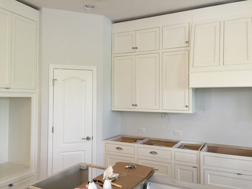 White Kitchen Cabinets Look Yellow, Freshly Painted White Cabinets Turning Yellow