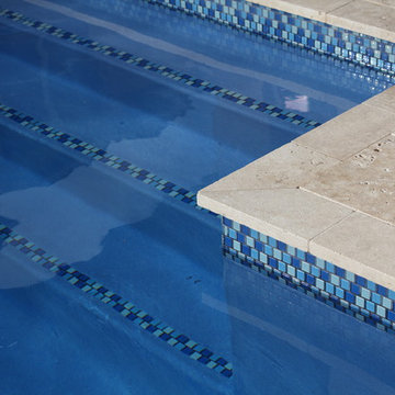 Custom Pool & Spa with Partially Raised Spa, and Fire Bowls in Boynton Beach