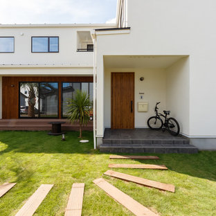 他の地域のコンテンポラリースタイルのおしゃれな家の外観 (片流れ屋根、戸建、金属屋根) の写真