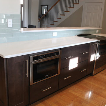 After: New opening into dining room with breakfast bar