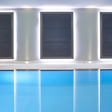Striking deck-level swimming pool in Northwood, London.