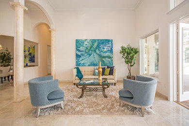 Living room - huge contemporary open concept travertine floor and beige floor living room idea in Tampa with beige walls