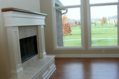 This is an example of a transitional living room in Indianapolis.