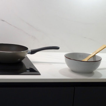 Illa | Una cocina moderna con isla de grandes dimensiones