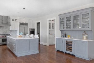 Inspiration for a kitchen remodel in Providence with subway tile backsplash and an island