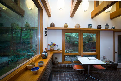 Arts and crafts sunroom photo in Other