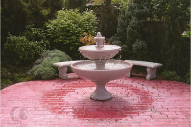 Design ideas for a small asian backyard water fountain landscape in Other.