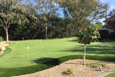Design ideas for a large traditional partial sun backyard outdoor basketball/tennis/multi-game court in Phoenix.