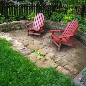 Distinct garden with pond and sunken patio