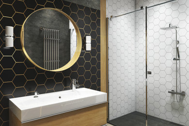 Photo of a medium sized industrial cream and black ensuite bathroom in London with flat-panel cabinets, light wood cabinets, a one-piece toilet, black and white tiles, porcelain tiles, multi-coloured walls, wood-effect flooring, a wall-mounted sink, brown floors, a feature wall, a single sink, a freestanding vanity unit and wood walls.