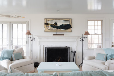 Example of a beach style home design design in Boston