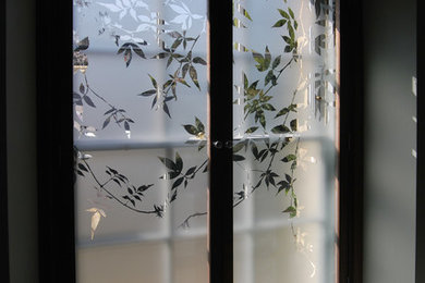 Etched glass for window shutters