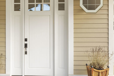 Example of a transitional exterior home design in Chicago