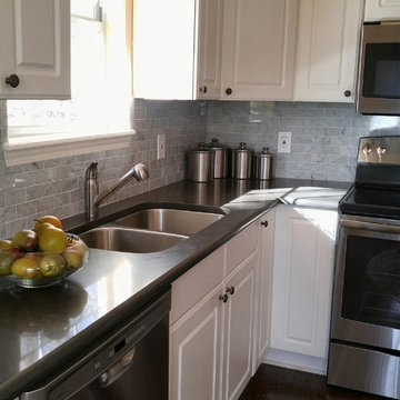 Caesarstone Piatra Grey Quartz Countertop with Carrara Marble Subway Tile