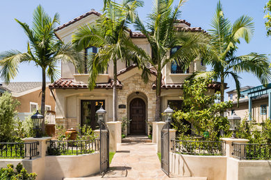 Tuscan home design photo in Orange County