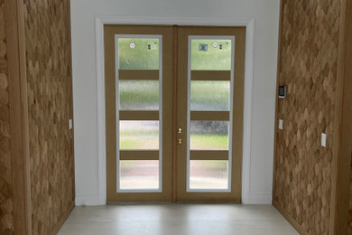 Entryway - contemporary entryway idea in Miami