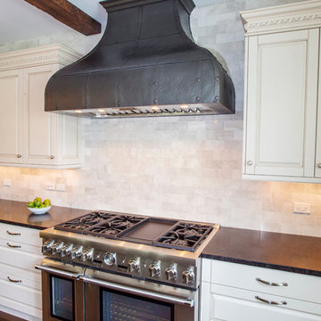Custom copper range hood with oil rubbed bronze finish