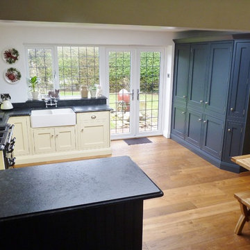 1909 in-frame charcoal and ivory kitchen, leathered steel grey granite worktops