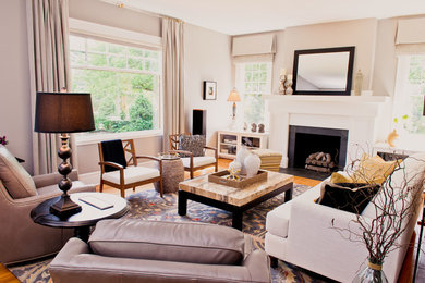 Mid-sized transitional formal and enclosed light wood floor living room photo in Other with gray walls, a standard fireplace, a stone fireplace and no tv