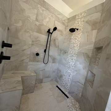 Curd-less walk-in shower; heated floors in bathroom + shower+bench LED