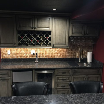 Custom Grey Distressed Cabinetry w/ Steel Grey Granite Tops (Cork Backsplash)