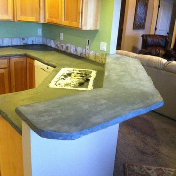 Concrete countertop overlay. Applied over old Formica