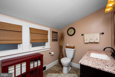 Arts and crafts bathroom photo in Other