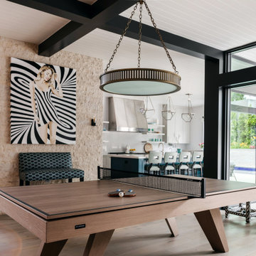 A Sleek Trigon Table -  that converts from billiards to dining & ping pong