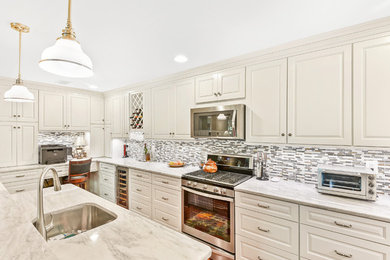 Inspiration for a contemporary l-shaped eat-in kitchen remodel in DC Metro with an island