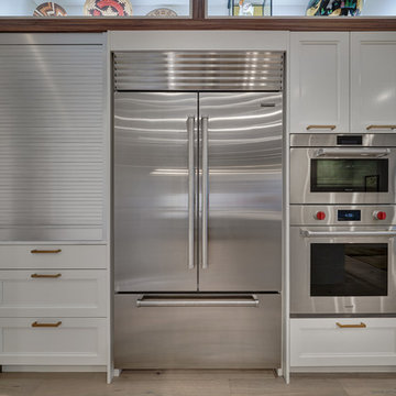 Modern Walnut Wrapped Gallery Kitchen