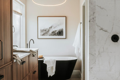 Bathroom - modern master porcelain tile porcelain tile and double-sink bathroom idea in Orlando with a two-piece toilet, an undermount sink, quartz countertops and a floating vanity