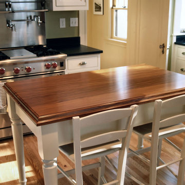 Afromosia table top by DeVos Custom Woodworking