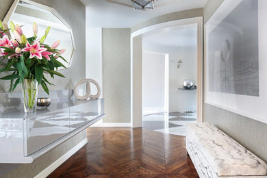 Inspiration for a transitional medium tone wood floor and brown floor entryway remodel in New York