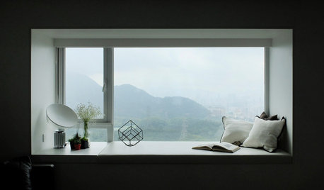 Houzz Гонконг: Свет и панорамные виды в минималистичной квартире