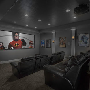 Design ideas for a medium sized traditional enclosed home cinema in Salt Lake City with grey walls, carpet and a projector screen.