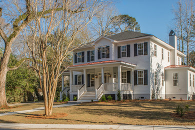 Photo of a transitional home design in Charleston.