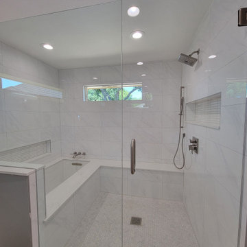 Two separate bathrooms converted into a master bathroom with a big open closet