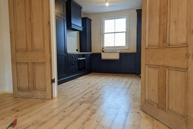 Inspiration for a medium sized victorian kitchen in London with light hardwood flooring.