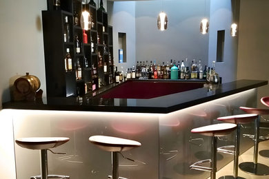 Inspiration for a contemporary home bar in London.