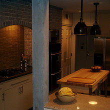 Brick Archway with white cabinets