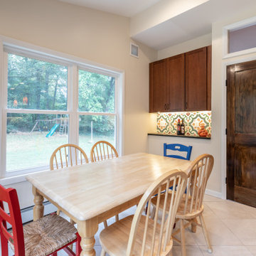 Cheerful Multi Level Rear Addition to Expand Kitchen, Mudroom & Sunroom in Oakt
