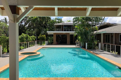 Example of a beach style pool design in Hawaii