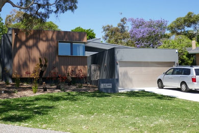 Photo of a contemporary home design in Perth.
