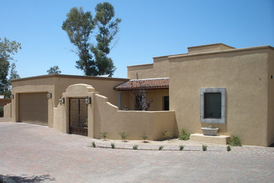 Example of a tuscan exterior home design in Phoenix