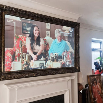 The Barbican TV Mirror In Antique Brass